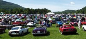 Beautiful cars in a bucolic setting on a lovely summer day!