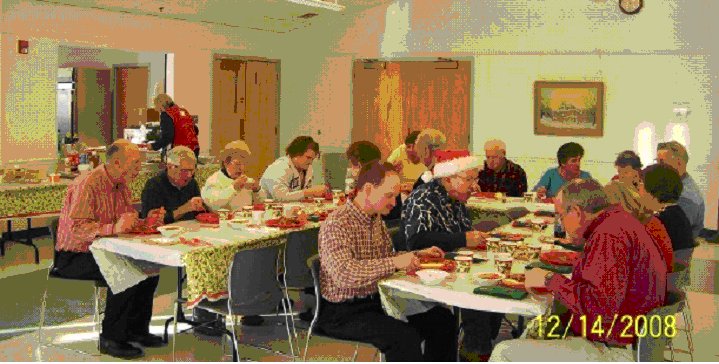 Club members enjoying the feast at last year's Christmas Party