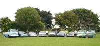 South Florida Corvairs enjoying a beautiful day with a fine display of their automobiles  From left to Right : 1962 Rampside; owner Mark Anderson; 1963 Spyder; Darrell Hollcroft; 1962 Monza; Ed Shannon; 1967 Monza; Tom Chapman; 1969 Monza; Tom Thomason, 1964 Monza; Pete Cannon; 1964 Monza; Stephen Dill; 1964 Greenbrier; John Policella