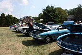Corvair_lineup_with_Monza_coupes.jpg
